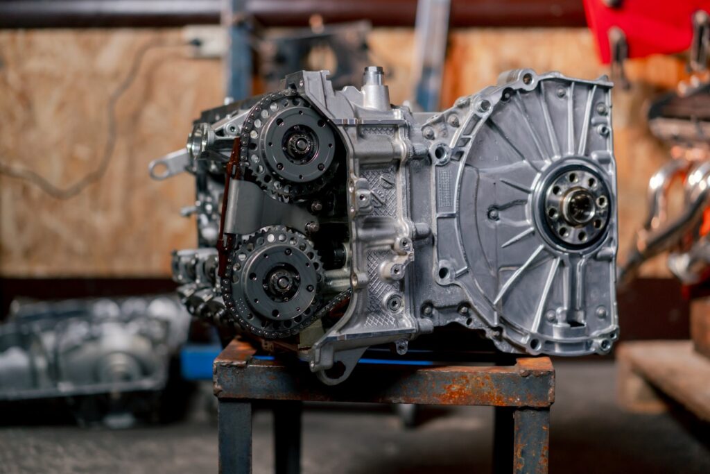Disassembled engine block on the table the mechanic opened the locking valve mechanism Motor capital repair